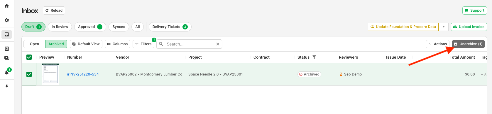 Archived invoice view with a record selected and the Unarchive button